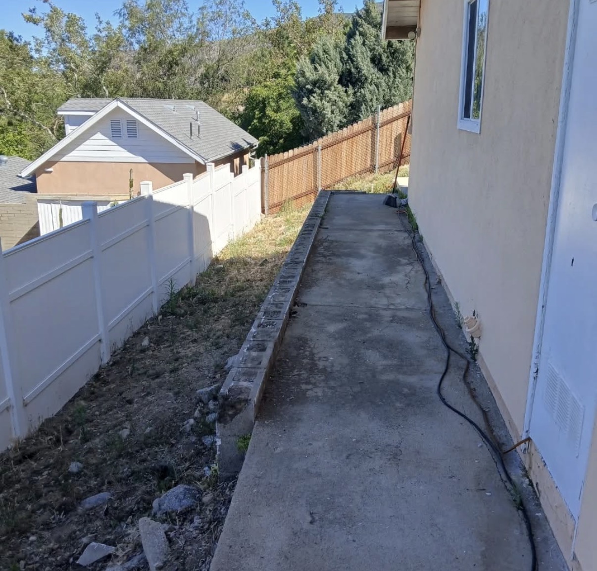 Before: empty side yard