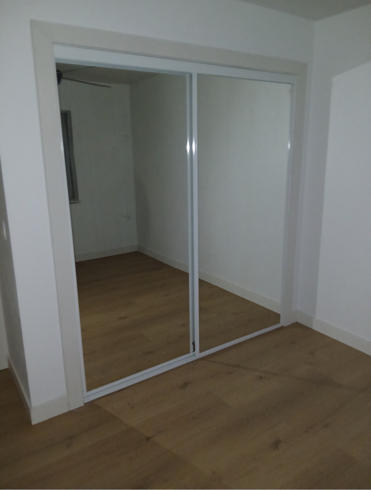 Mirrored sliding closet doors installed
