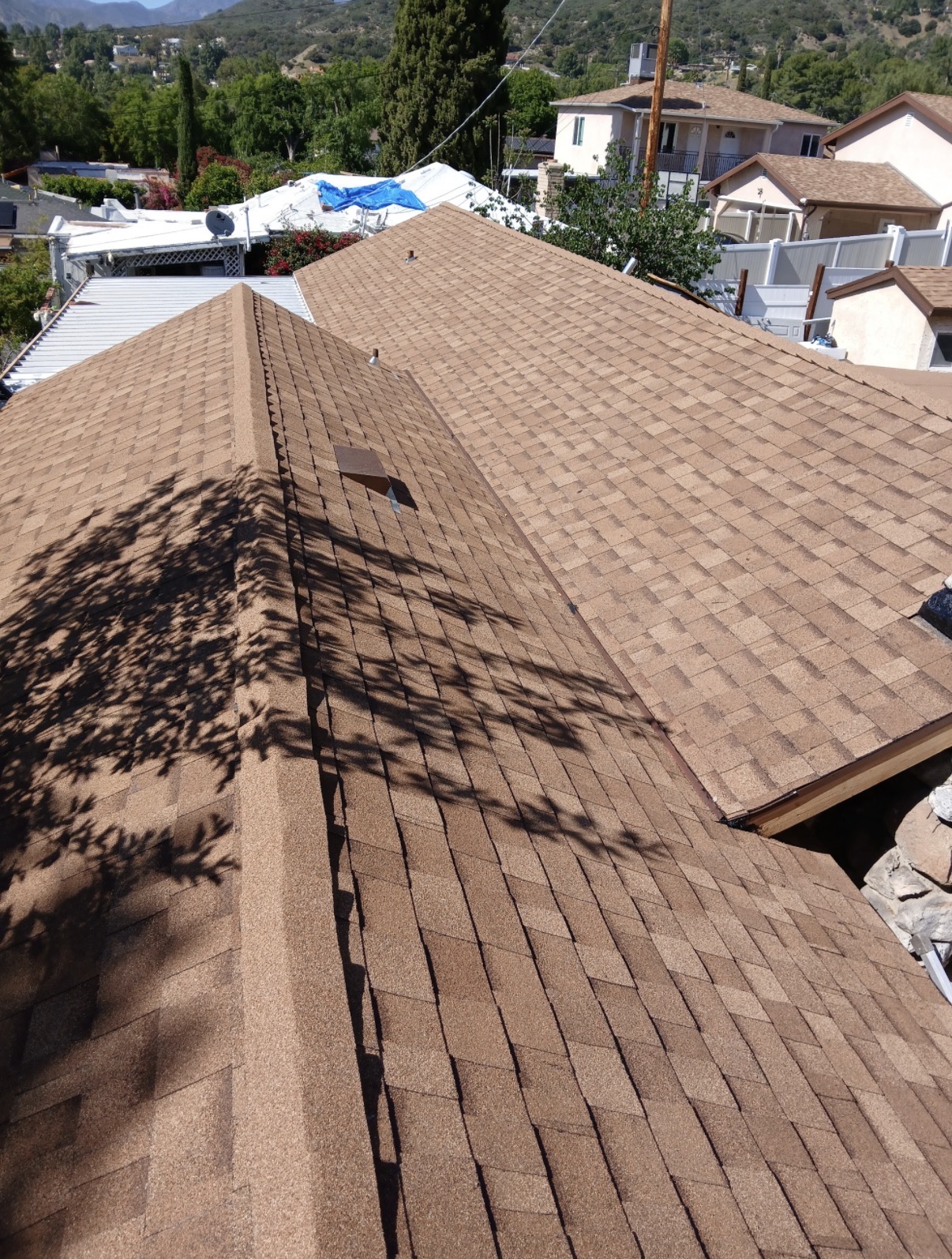 Completed shingled roof from above