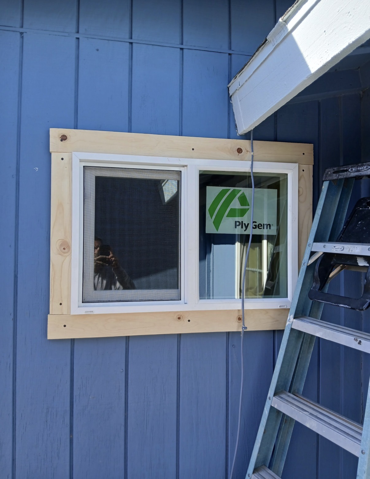 New PlyGem dual-pane window with fresh wood trim